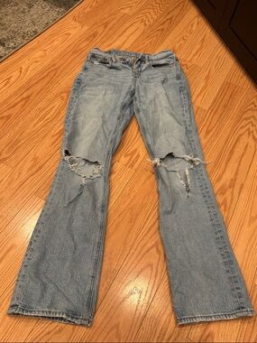 American Eagle Outfitters Light Blue Flare Jeans with Knee Rips